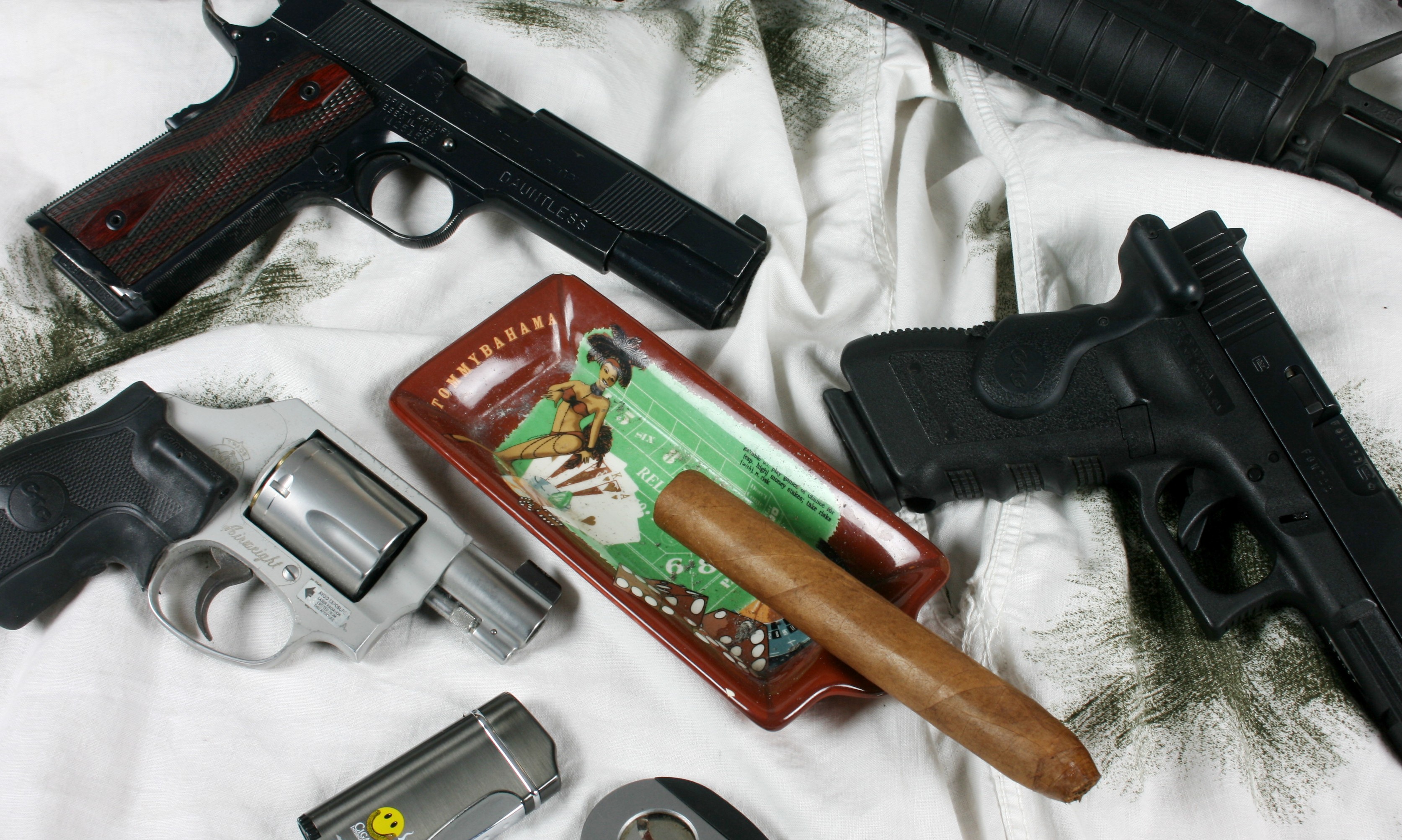 Gun and Cigars – Lets Strike a Match Up